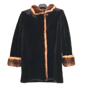 Two toned faux fur coat. Never worn.